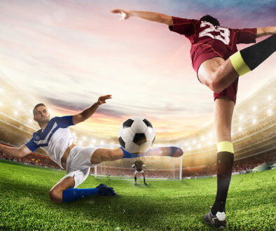 Soccer striker hits the ball with an acrobatic kick. 3D Rendering